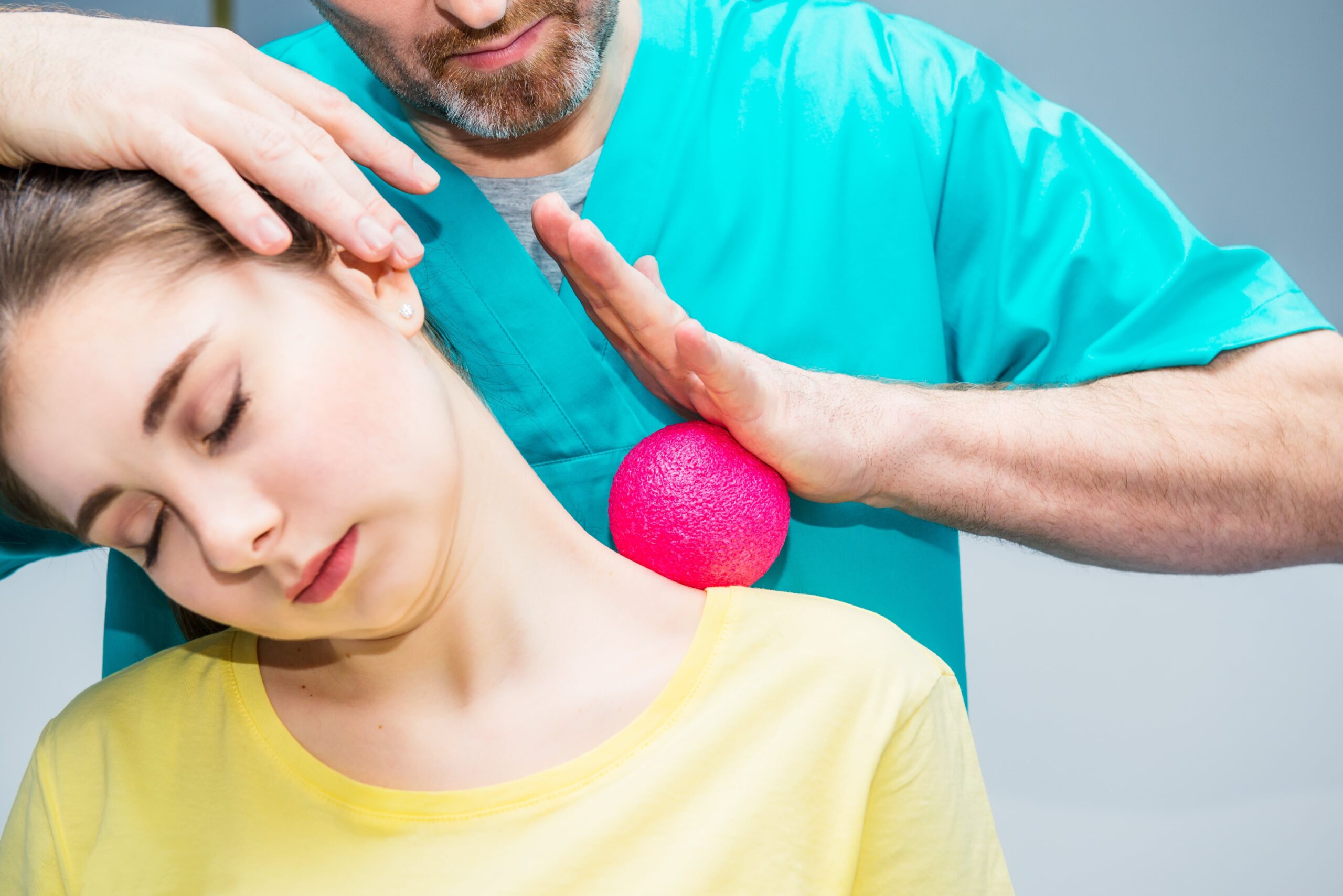 woman-at-the-physiotherapy-receiving-ball-massage-2021-08-31-15-09-50-utc-min